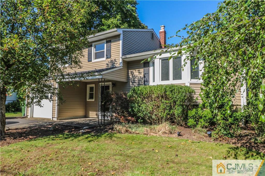39 Outcalt Road Edison, NJ 08817 - Photo 1 of 17 a view of a house with a yard