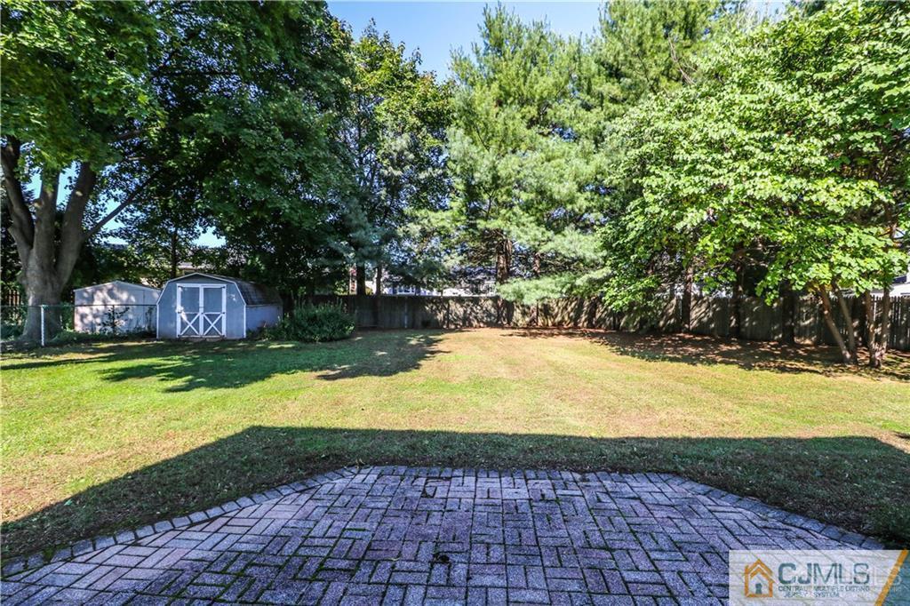 39 Outcalt Road Edison, NJ 08817 - Photo 16 of 17 a view of swimming pool with garden