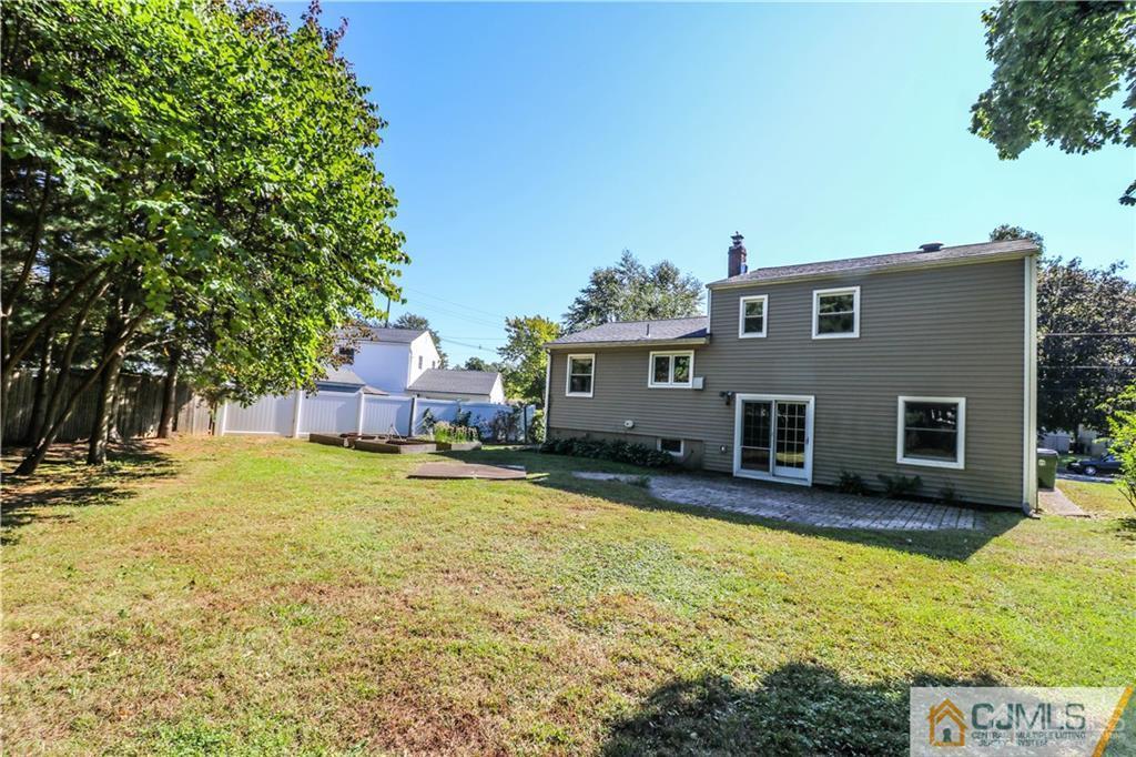 39 Outcalt Road Edison, NJ 08817 - Photo 17 of 17 a house view with a garden space