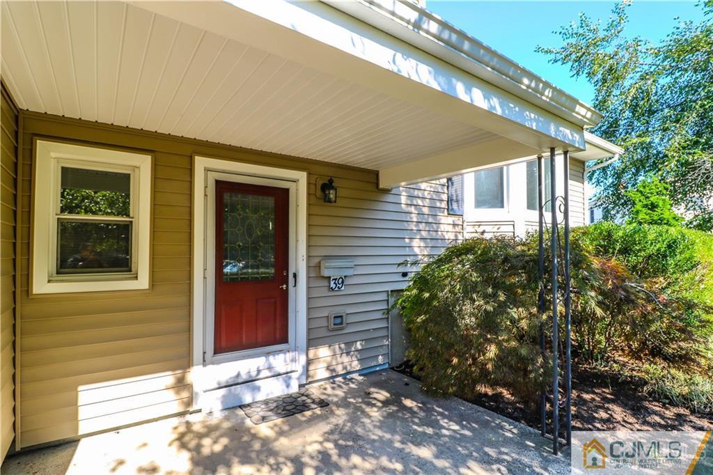 39 Outcalt Road Edison, NJ 08817 - Photo 3 of 17 a view of house with backyard
