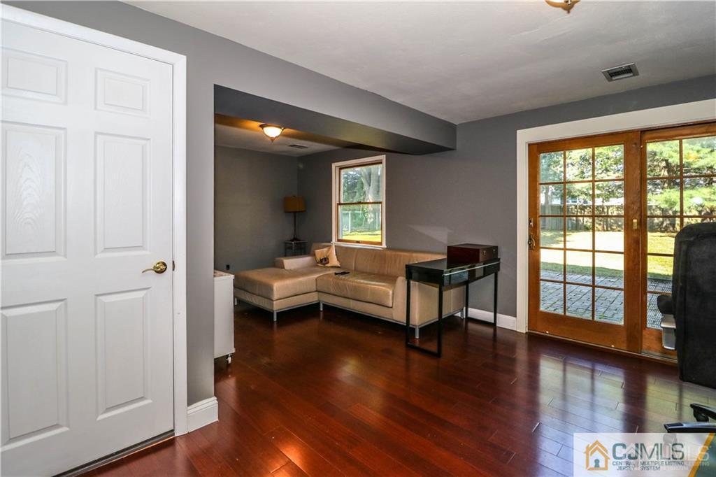 39 Outcalt Road Edison, NJ 08817 - Photo 4 of 17 a living room with furniture and a wooden floor