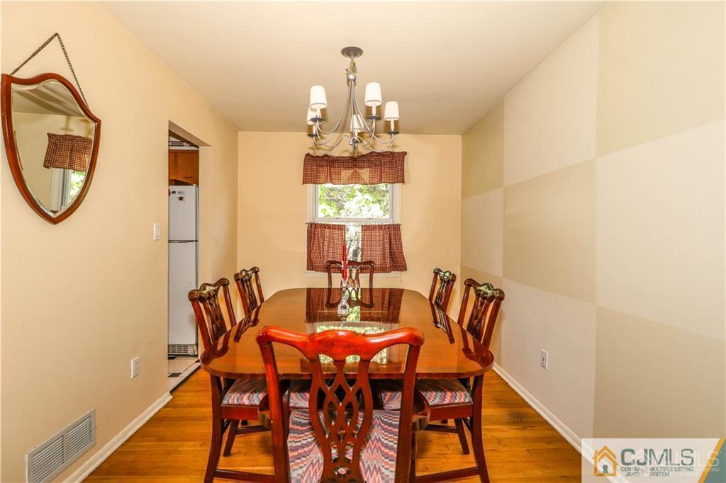 39 Outcalt Road Edison, NJ 08817 - Photo 6 of 17 a view of a dining room with furniture and window