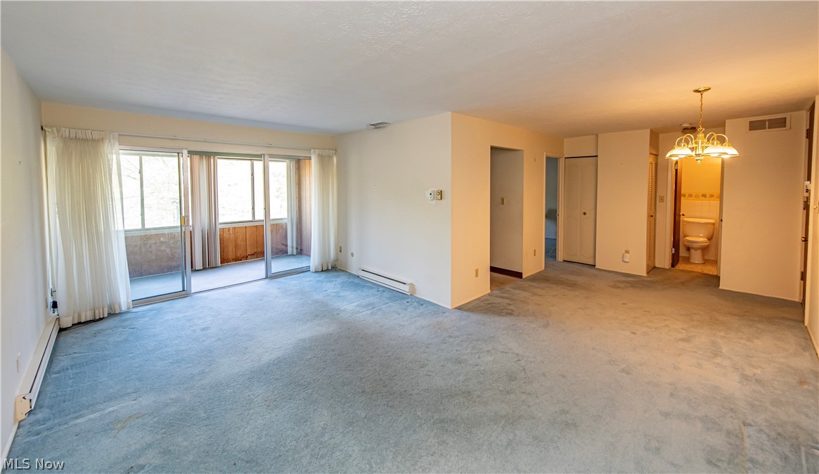 3064 Kent Road, Unit 309A Stow, OH 44224 - Photo 8 of 27 Open concept living room and dining area