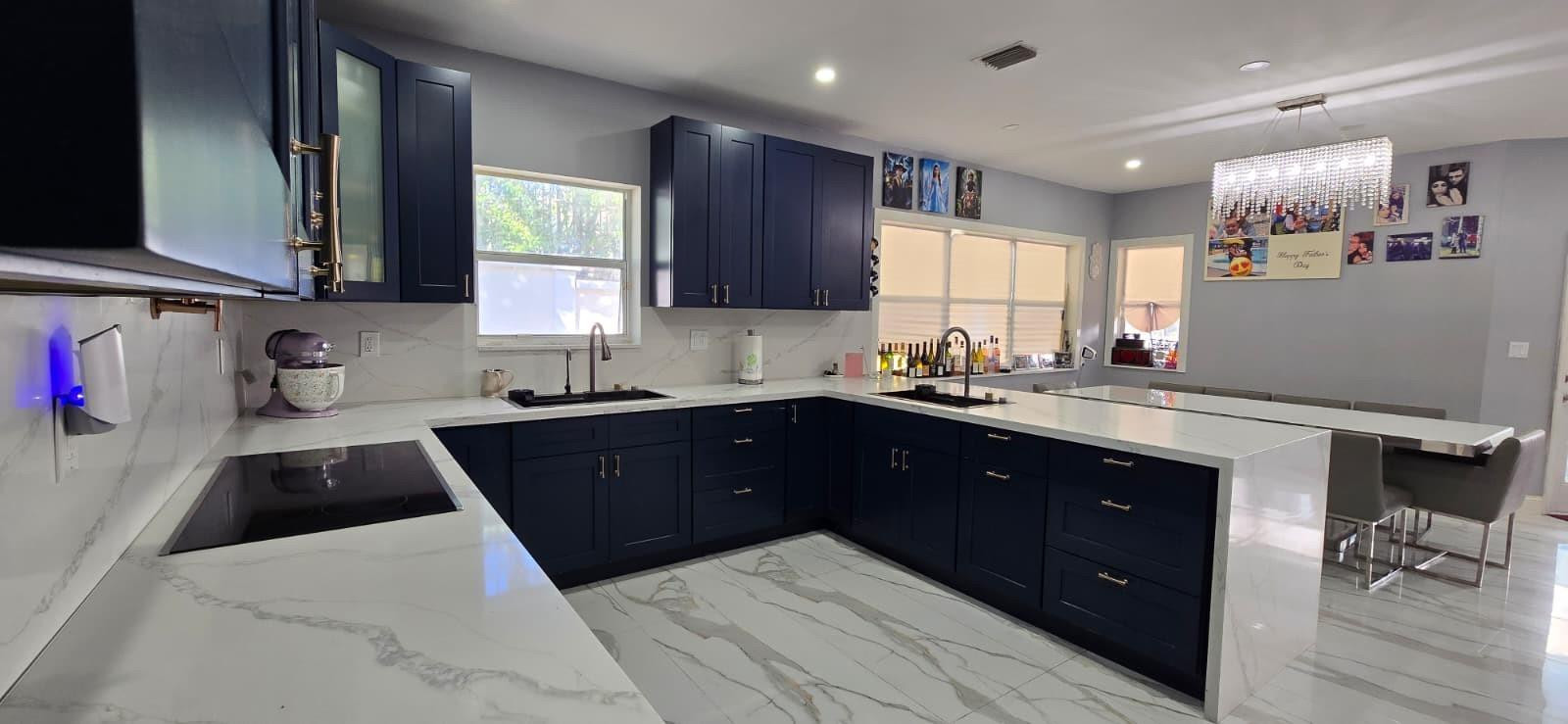 1888 Northwest 75th Way Hollywood, FL 33024 - Photo 18 of 45 a kitchen with a refrigerator sink and wooden cabinets