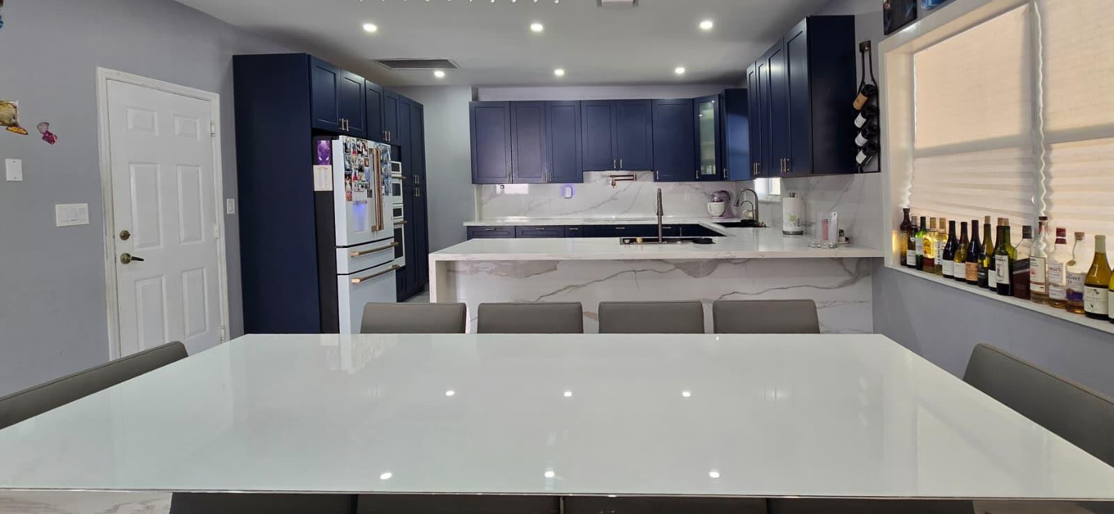 1888 Northwest 75th Way Hollywood, FL 33024 - Photo 27 of 45 a kitchen with stainless steel appliances a refrigerator and a sink