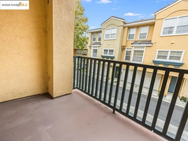a view of a building from a balcony