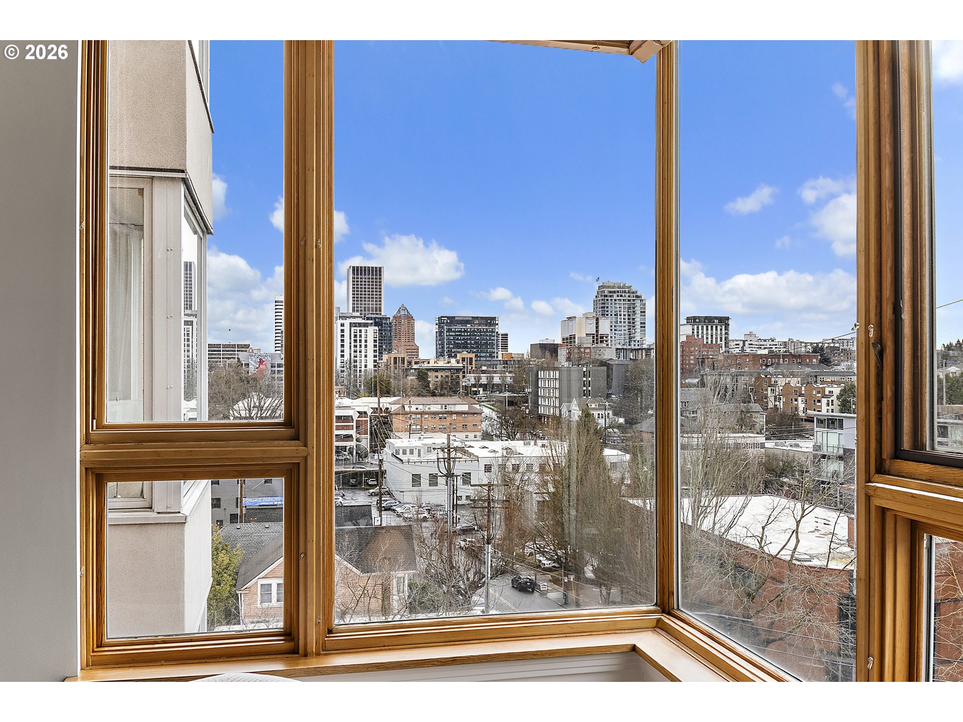 1132 Southwest 19th Avenue, Unit 505 Portland, OR 97205 - Photo 11 of 36 a view of a city from a window