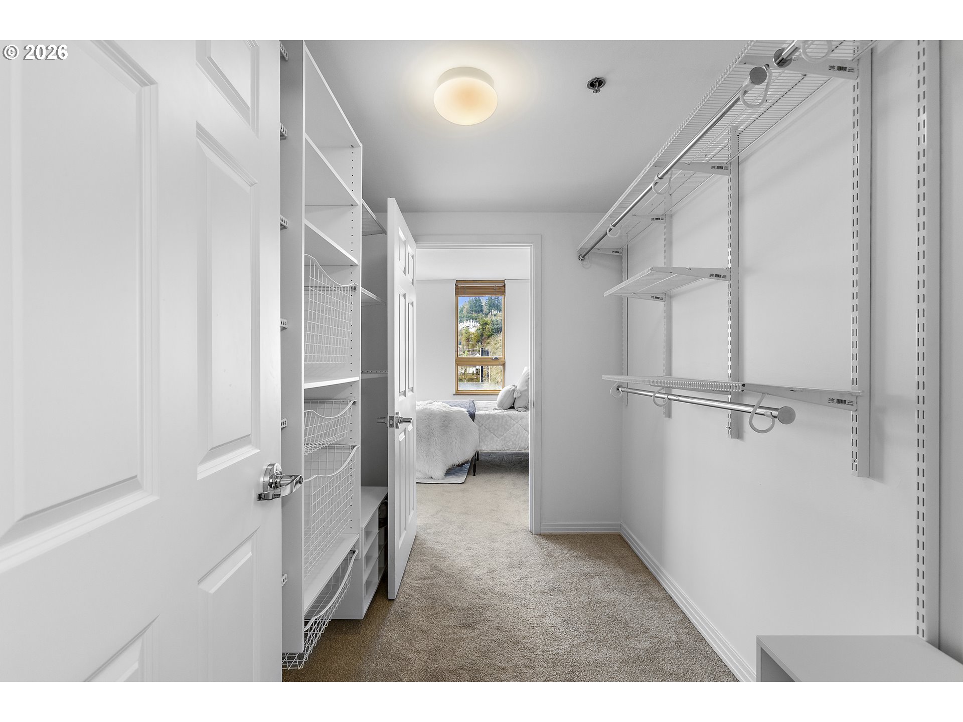 1132 Southwest 19th Avenue, Unit 505 Portland, OR 97205 - Photo 19 of 36 a hall way with a furniture and a window