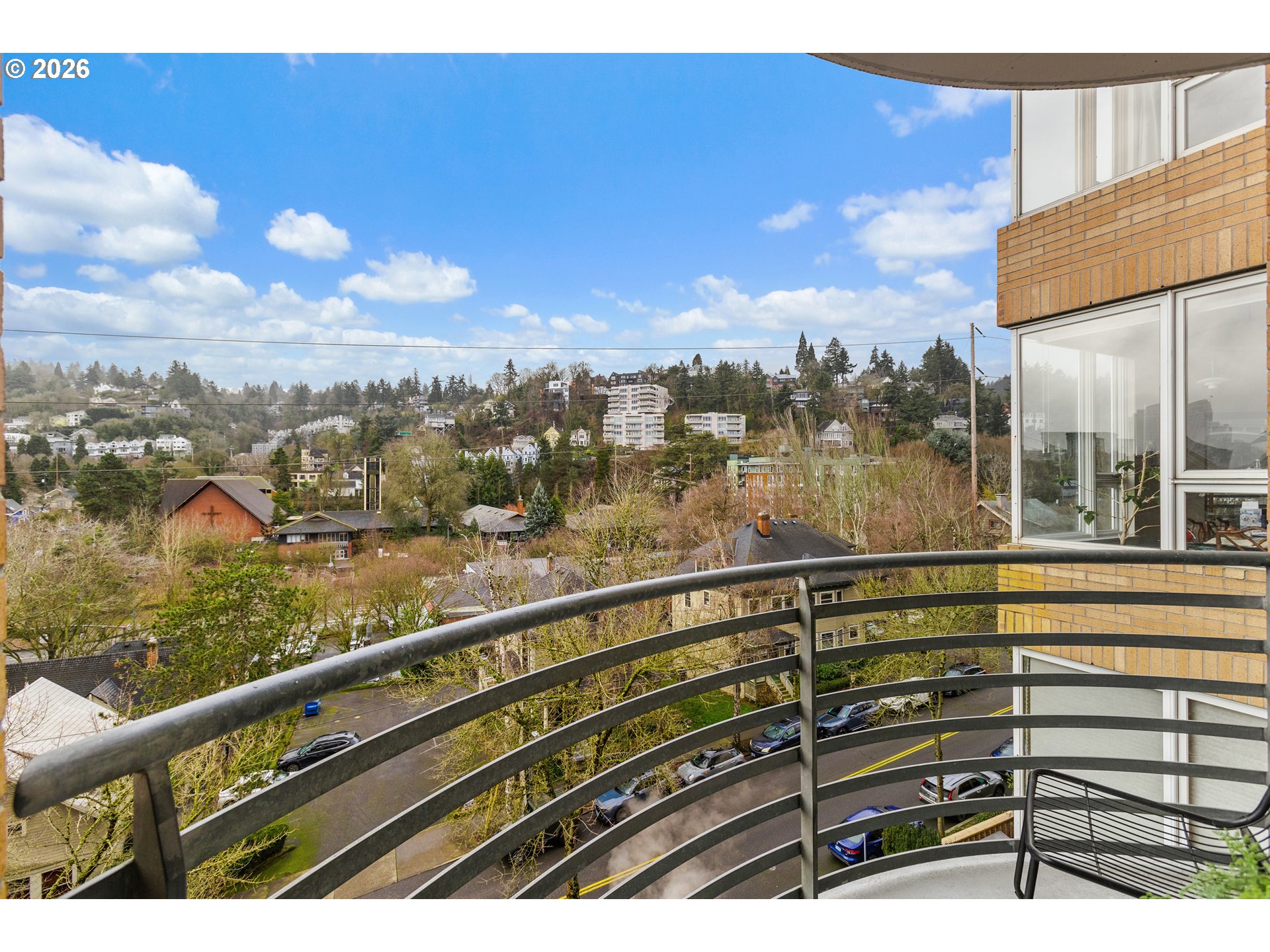 1132 Southwest 19th Avenue, Unit 505 Portland, OR 97205 - Photo 21 of 36 a view of city from a balcony