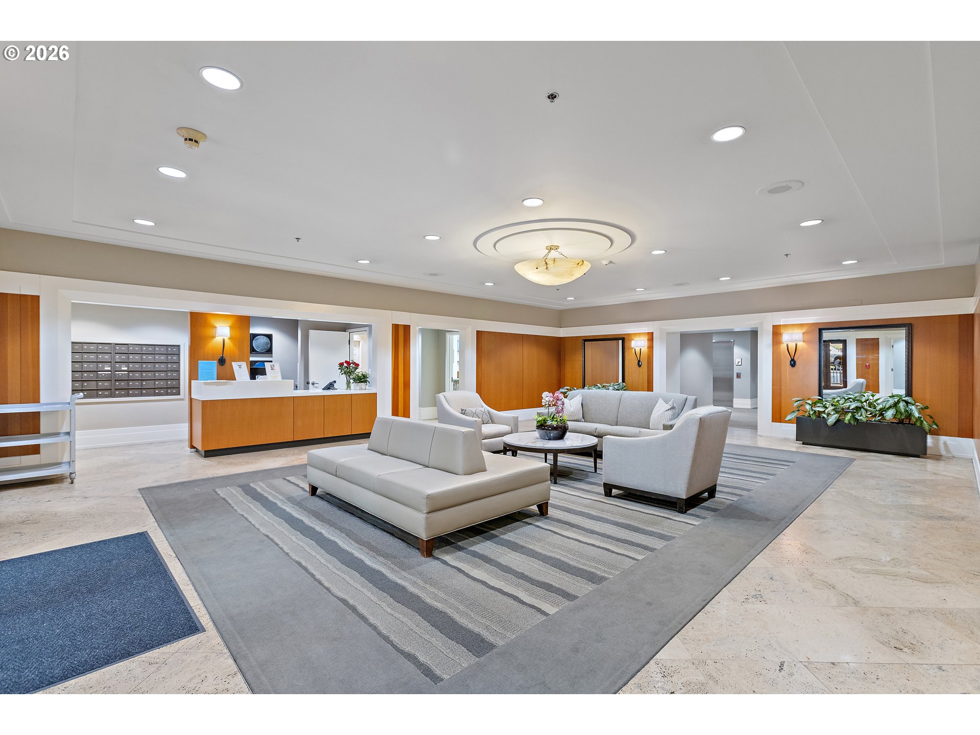 1132 Southwest 19th Avenue, Unit 505 Portland, OR 97205 - Photo 22 of 36 a living room with furniture and a large window
