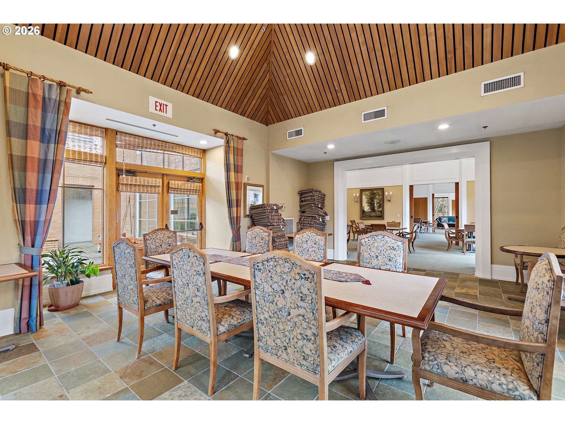 1132 Southwest 19th Avenue, Unit 505 Portland, OR 97205 - Photo 25 of 36 a dining room with furniture and wooden floor