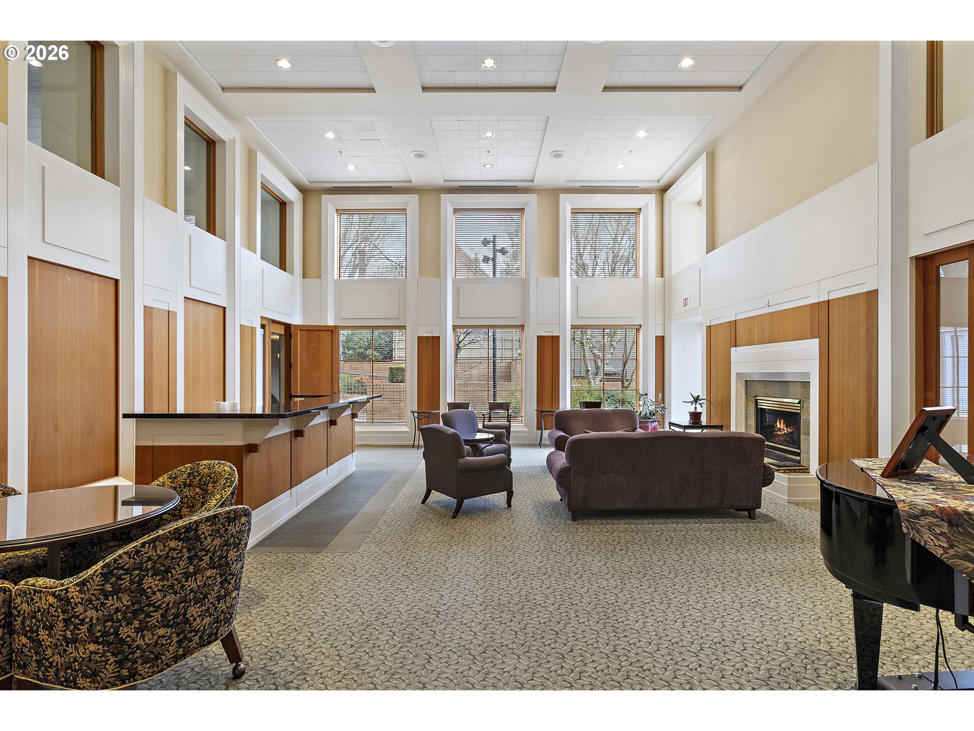 1132 Southwest 19th Avenue, Unit 505 Portland, OR 97205 - Photo 27 of 36 a living room with furniture fireplace and flat screen tv