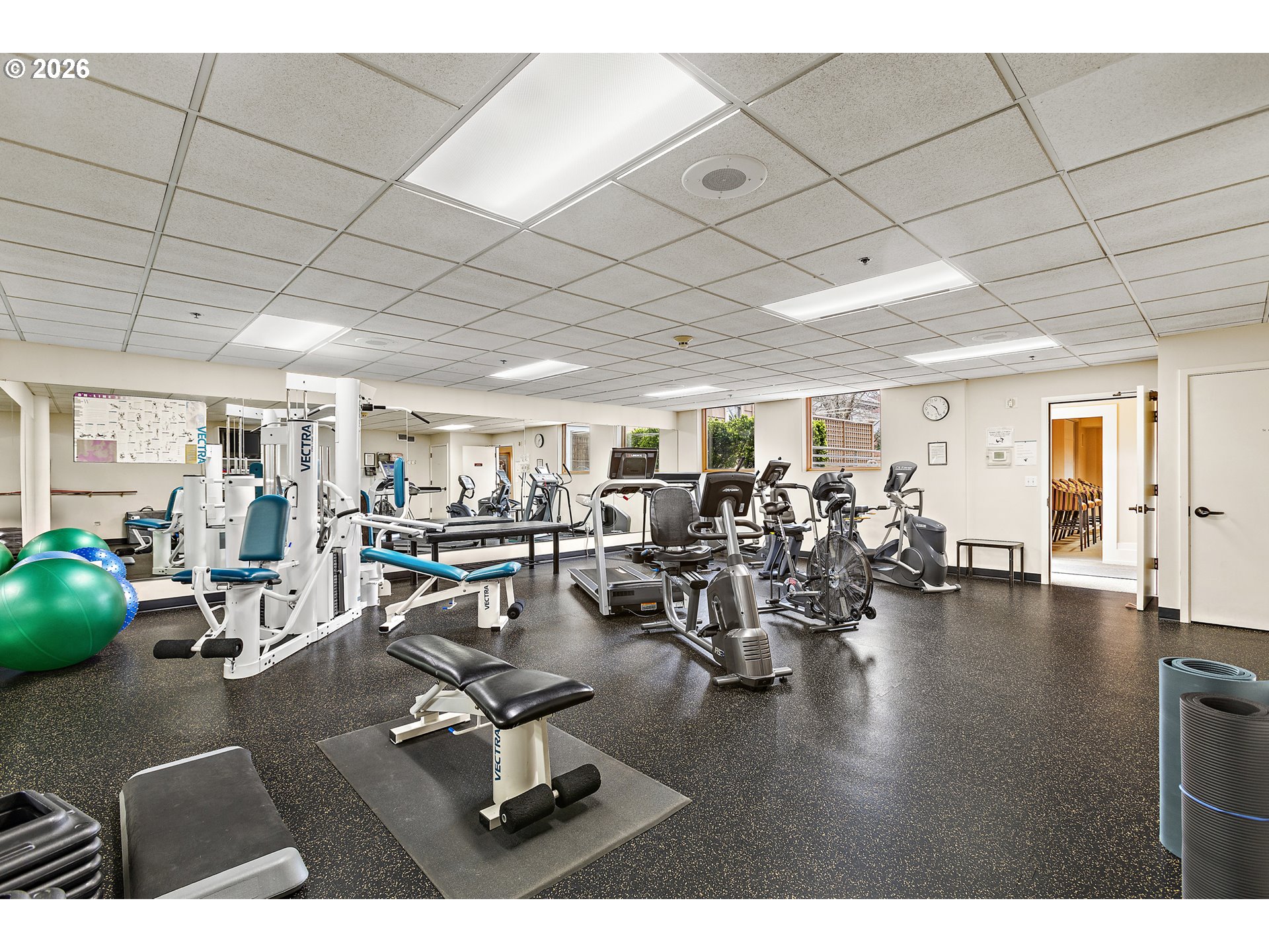 1132 Southwest 19th Avenue, Unit 505 Portland, OR 97205 - Photo 28 of 36 a view of a room with lots of gym equipment