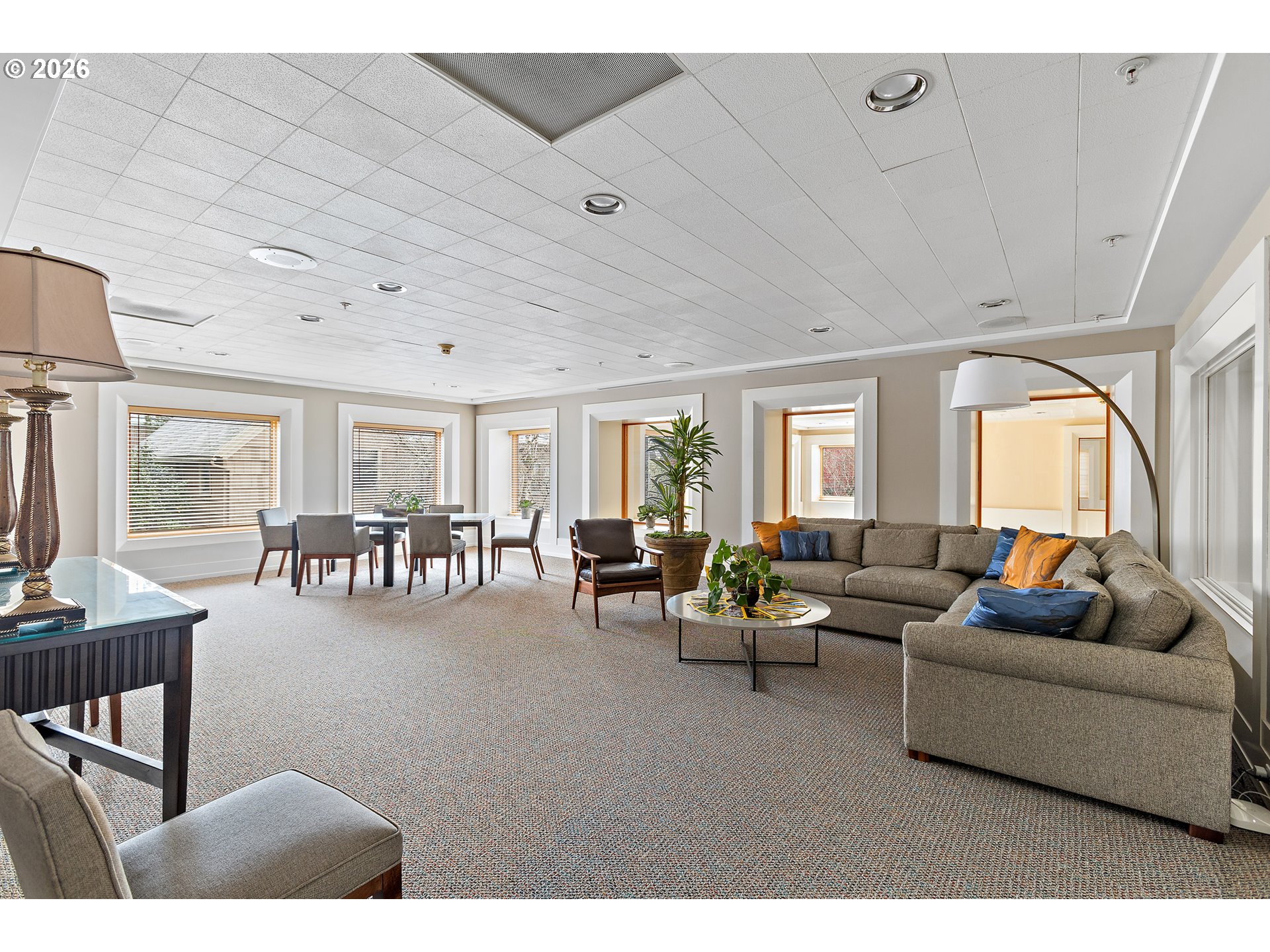 1132 Southwest 19th Avenue, Unit 505 Portland, OR 97205 - Photo 31 of 36 a living room with furniture and a table