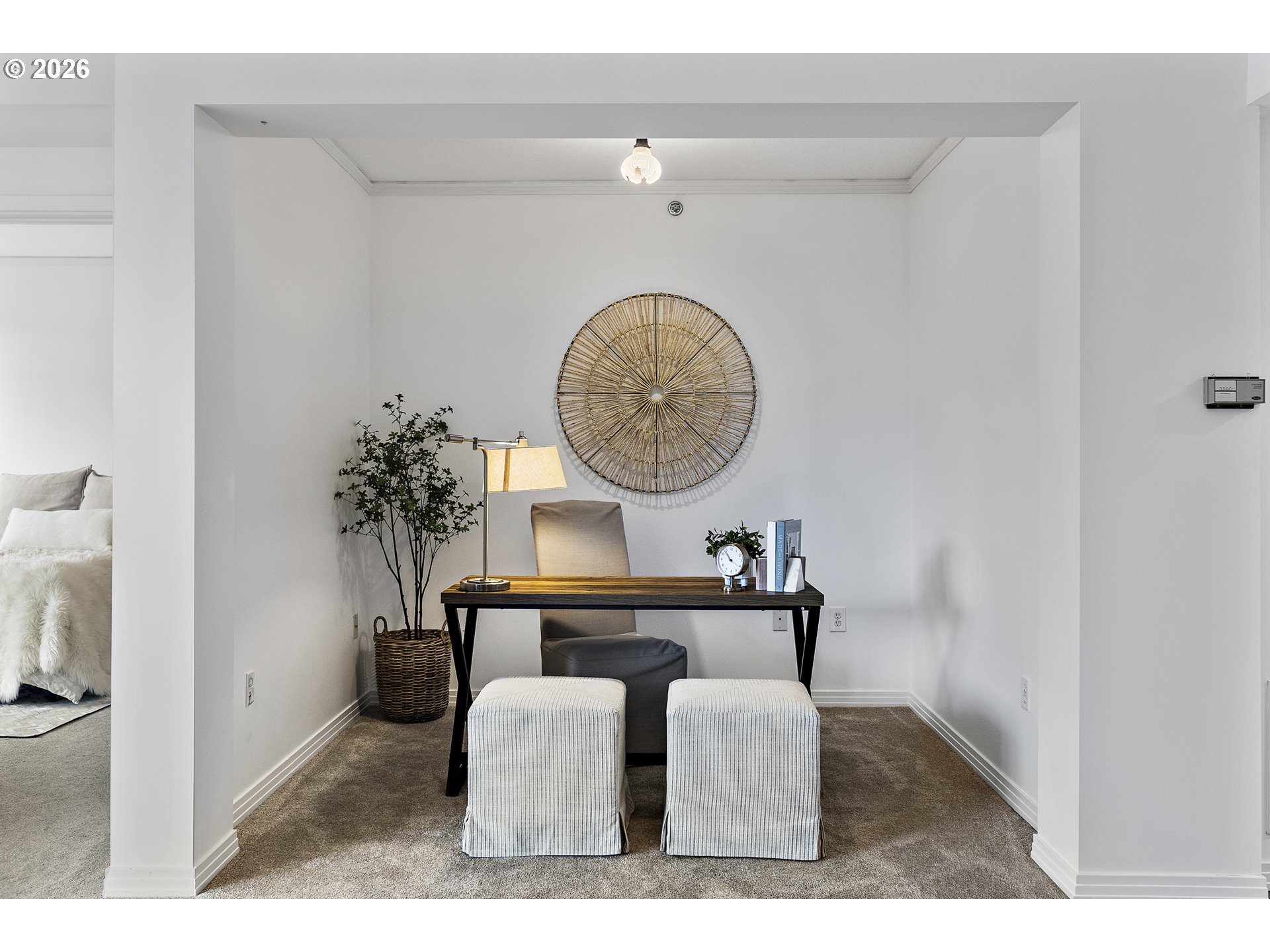 1132 Southwest 19th Avenue, Unit 505 Portland, OR 97205 - Photo 10 of 36 a living room with furniture and a mirror