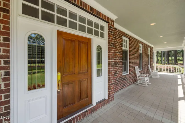 a view of an entryway with a door