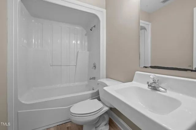 a aerial view of a house with swimming pool and big yard