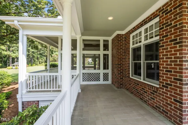 a view of a house with a big yard