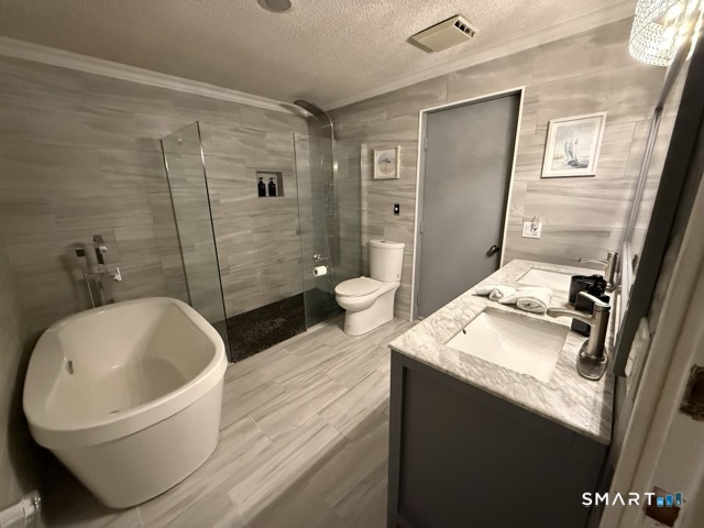 7 Riverview Street Enfield, CT 06082 - Photo 14 of 29 a bathroom with a granite countertop sink toilet and shower