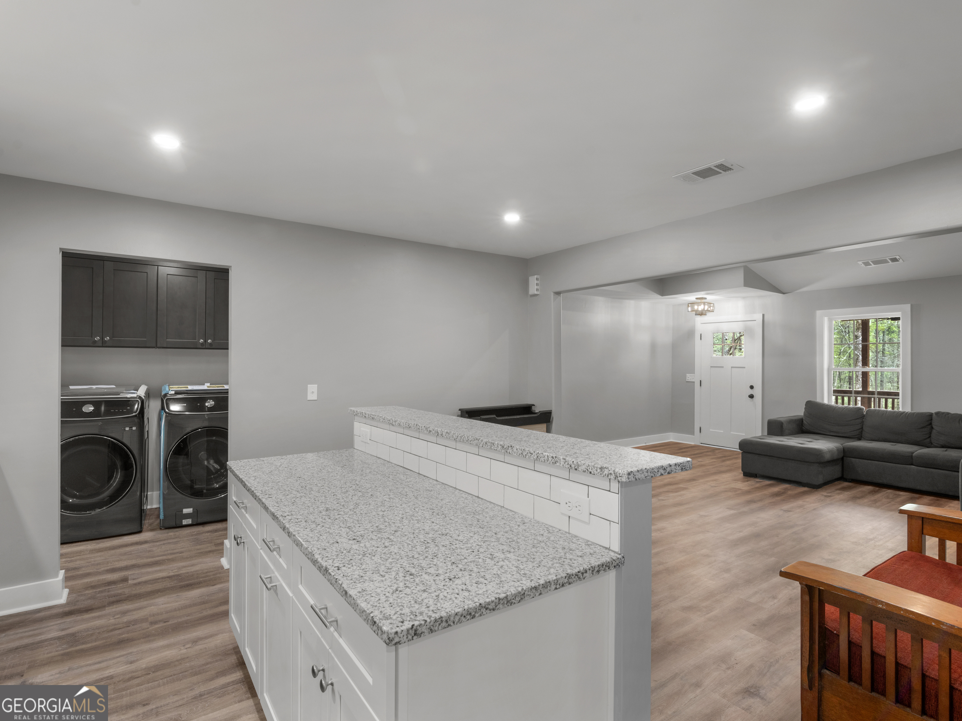 265 Steele Road Griffin, GA 30223 - Photo 16 of 64 a kitchen with a stove and a refrigerator