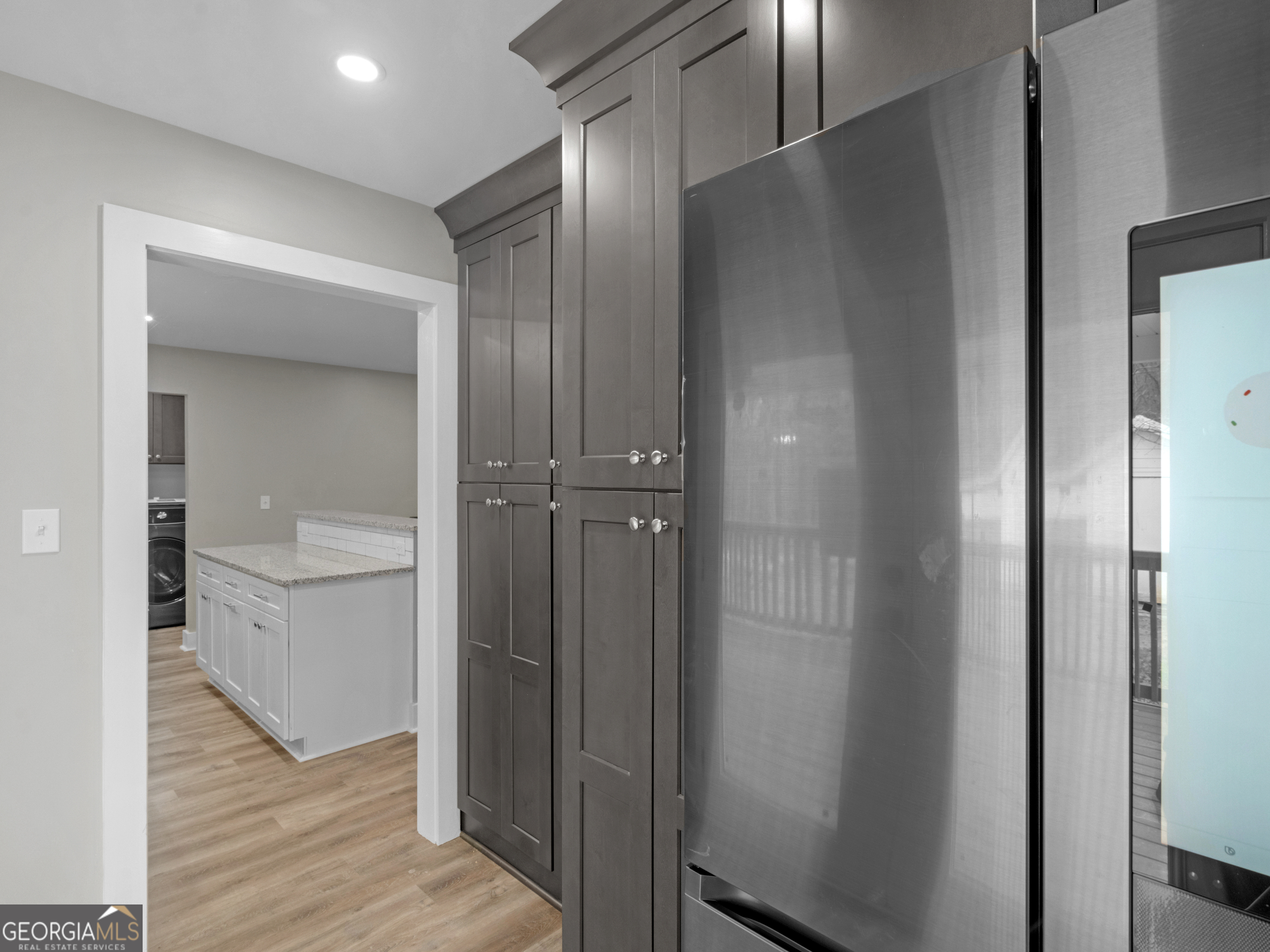 265 Steele Road Griffin, GA 30223 - Photo 18 of 64 a bathroom with a glass shower door and a sink
