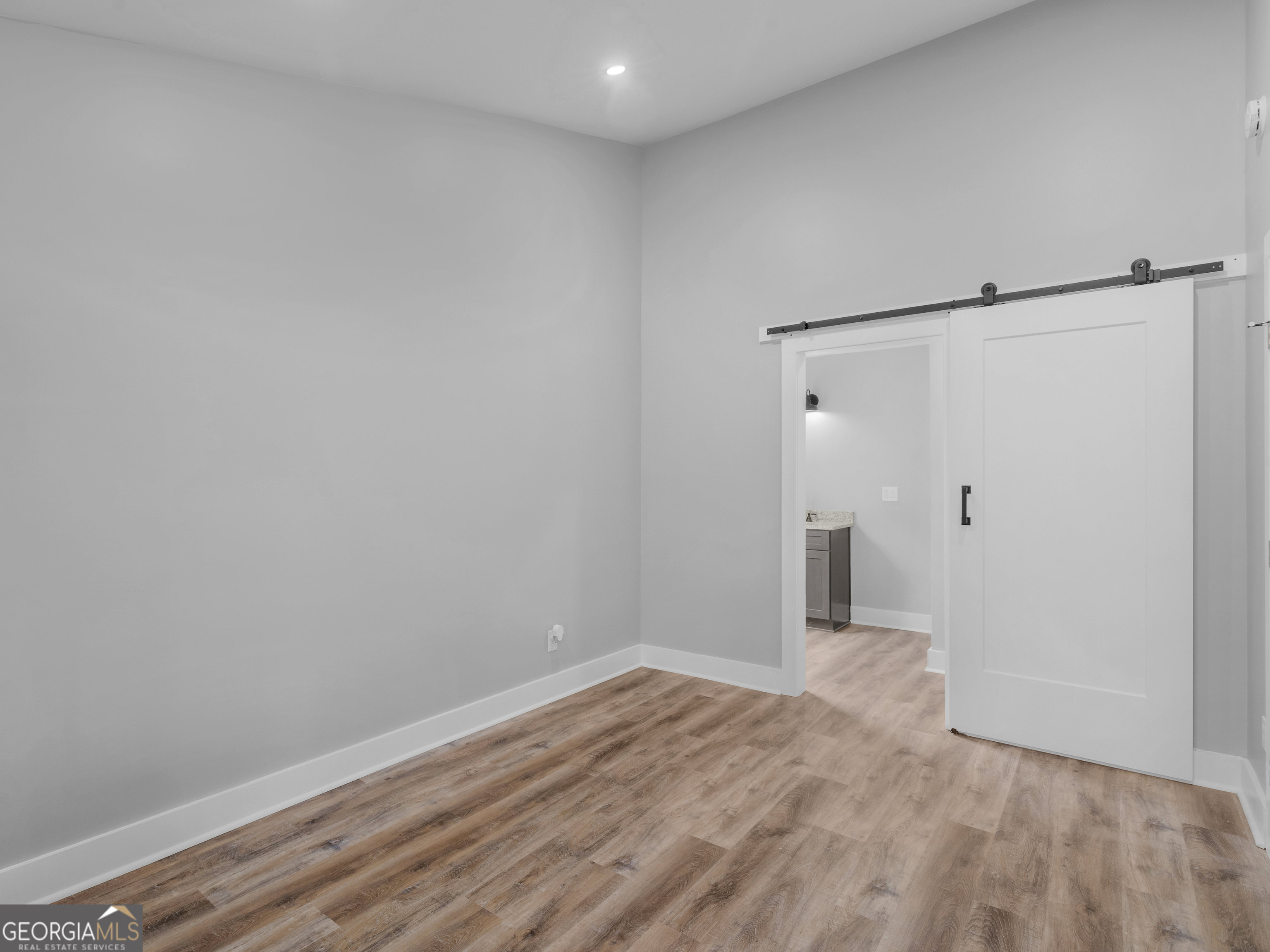 265 Steele Road Griffin, GA 30223 - Photo 23 of 64 a view of a room with wooden floor