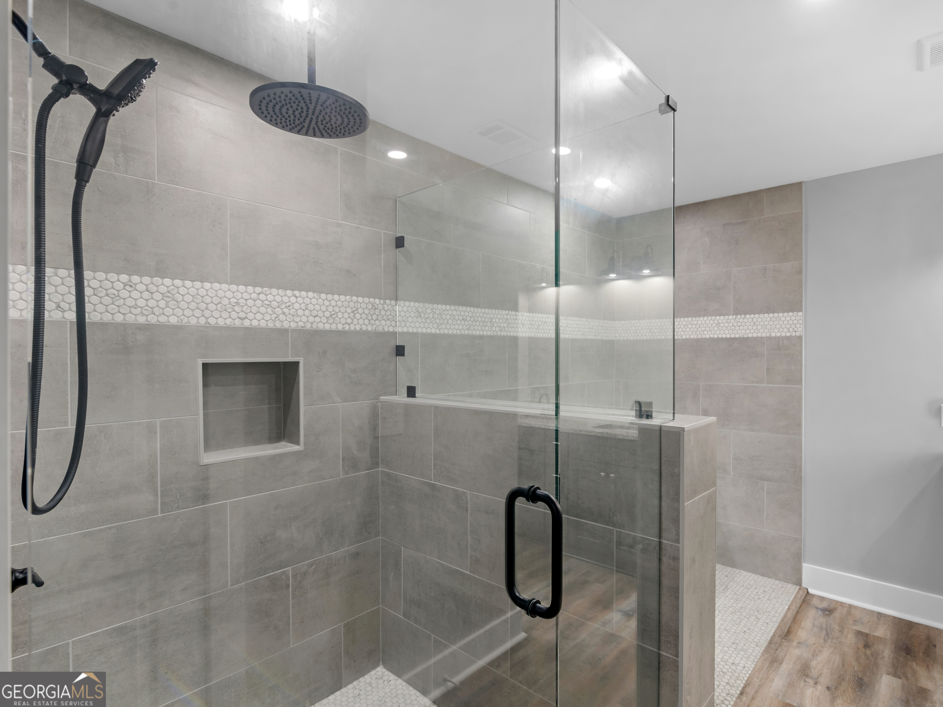 265 Steele Road Griffin, GA 30223 - Photo 29 of 64 a bathroom with a shower and a mirror