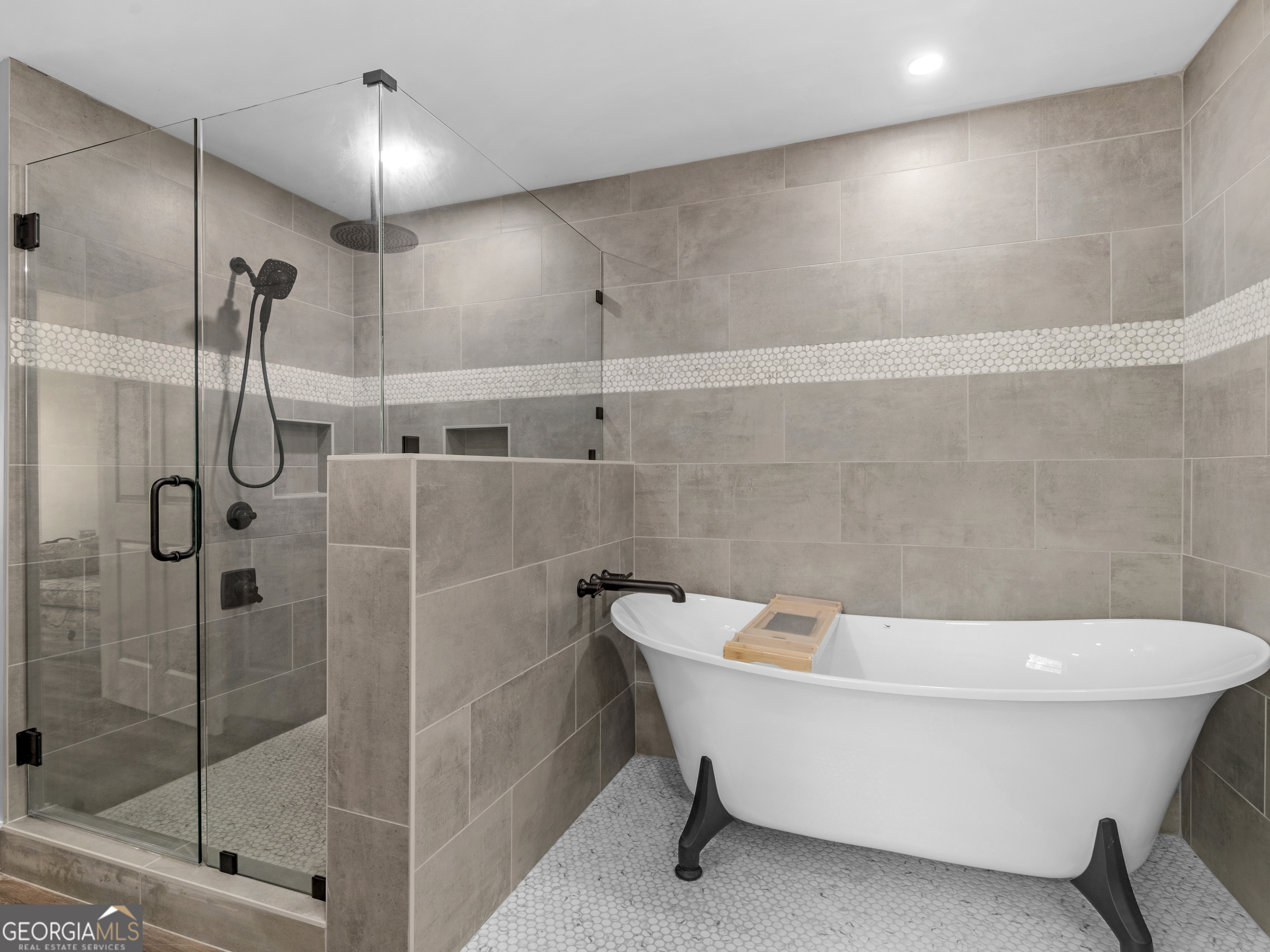 265 Steele Road Griffin, GA 30223 - Photo 31 of 64 a bathroom with a white bath tub and shower