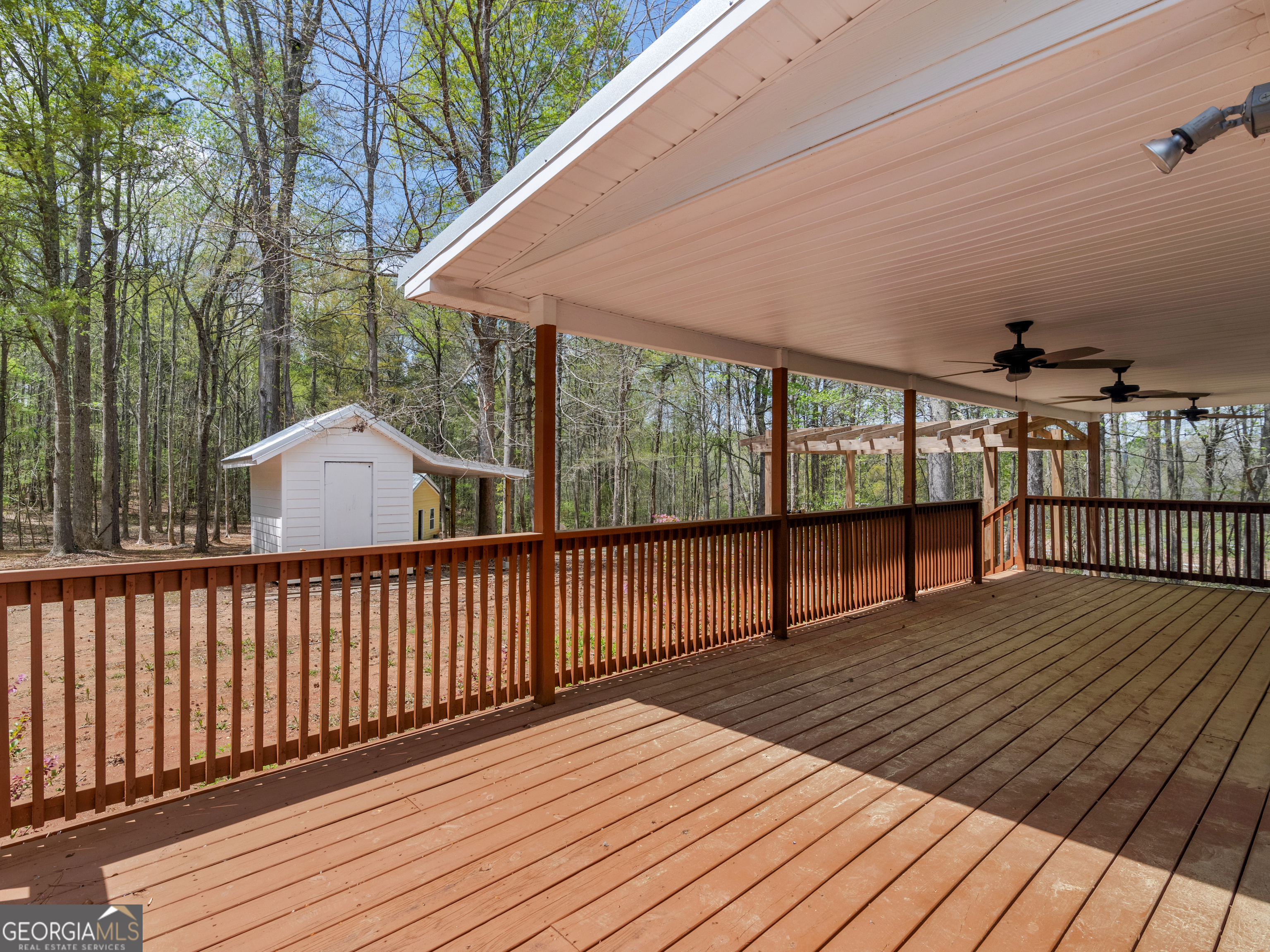 265 Steele Road Griffin, GA 30223 - Photo 34 of 64 a balcony with wooden floor