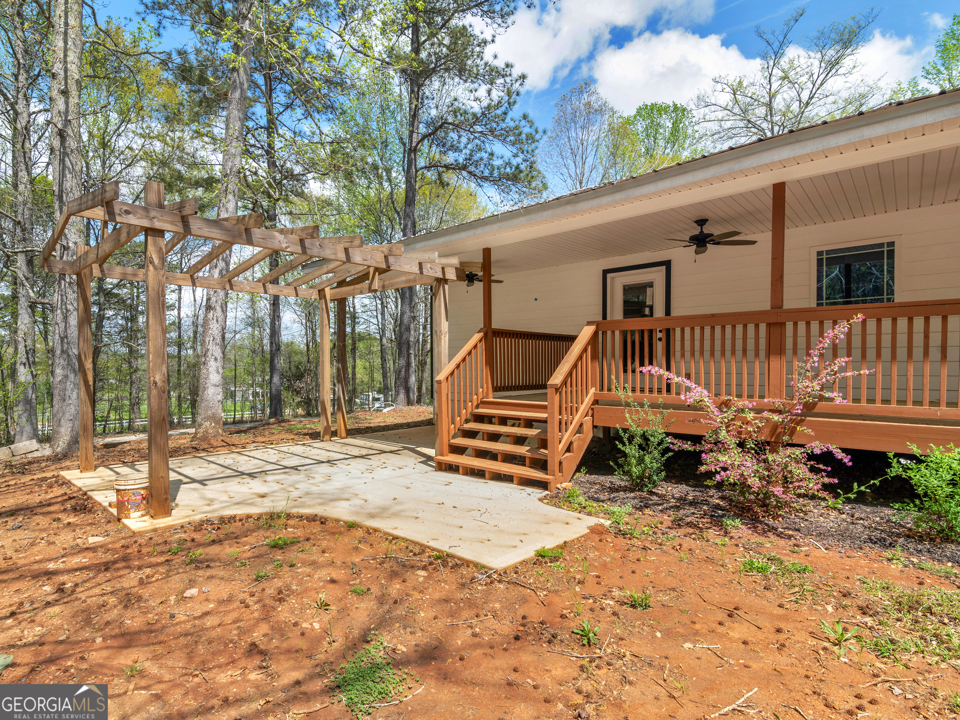 265 Steele Road Griffin, GA 30223 - Photo 36 of 64 a view of a house with backyard and sitting area