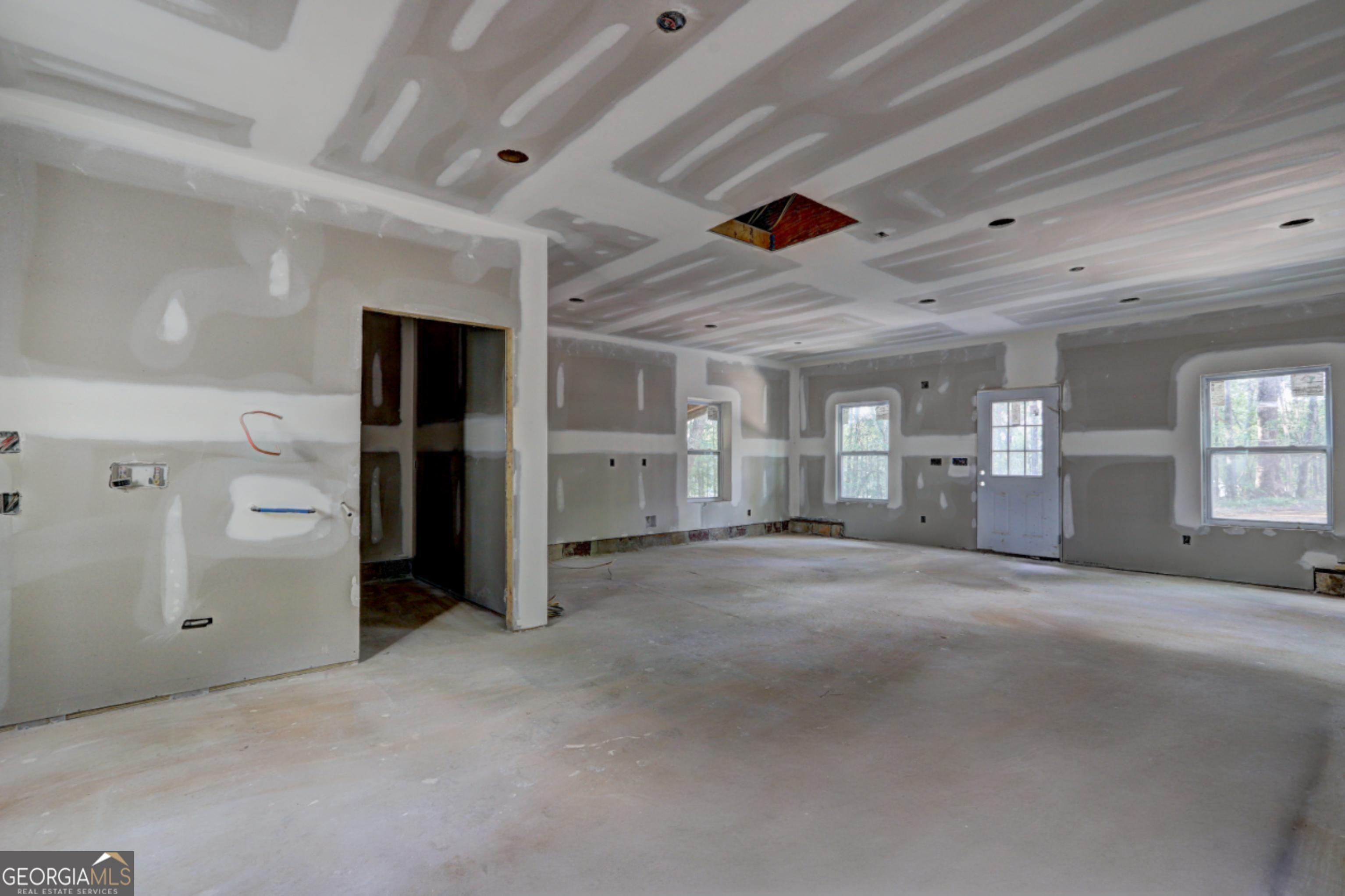 265 Steele Road Griffin, GA 30223 - Photo 43 of 64 a view of empty room with windows