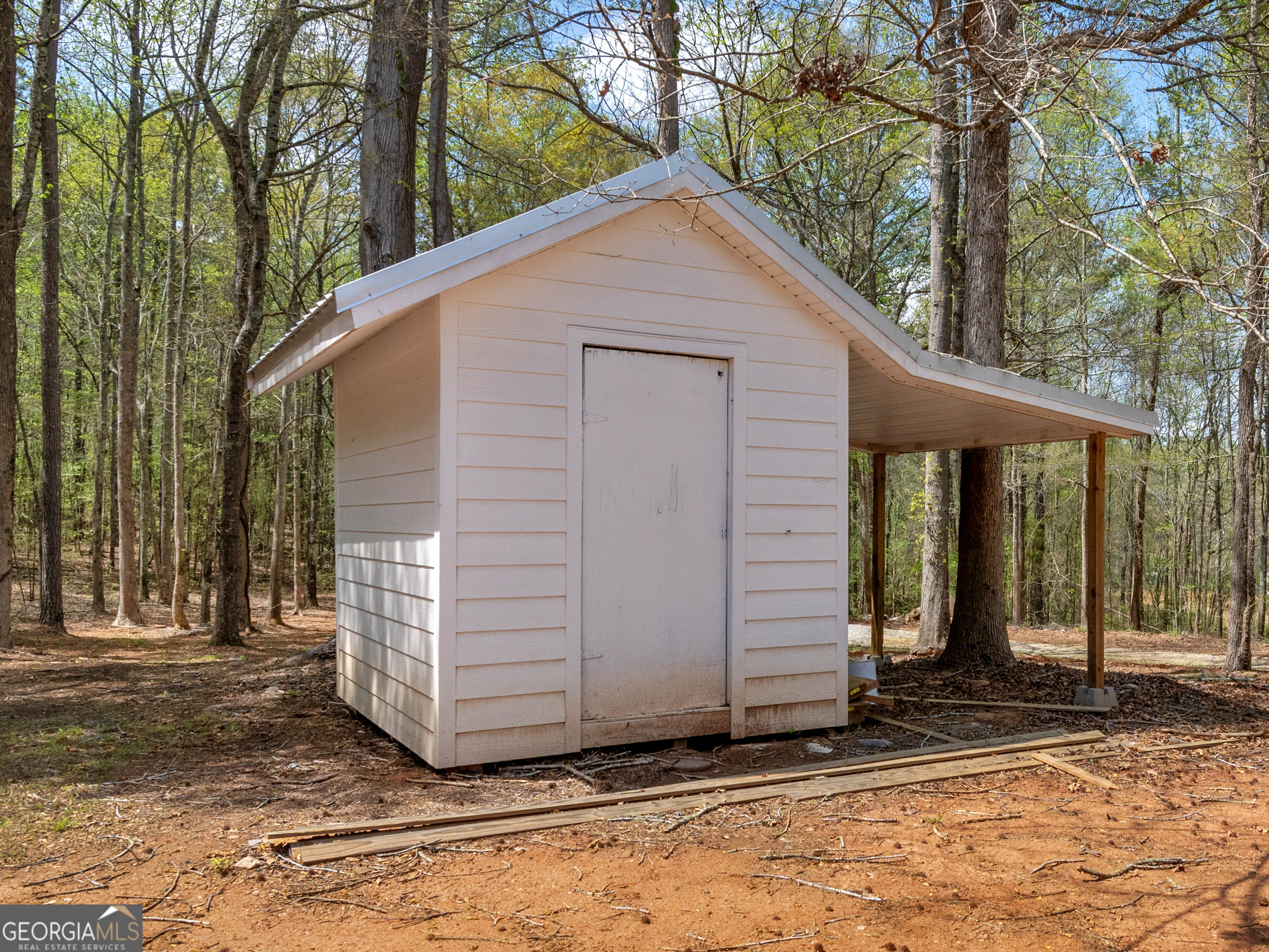 265 Steele Road Griffin, GA 30223 - Photo 48 of 64 a view of a house with a yard