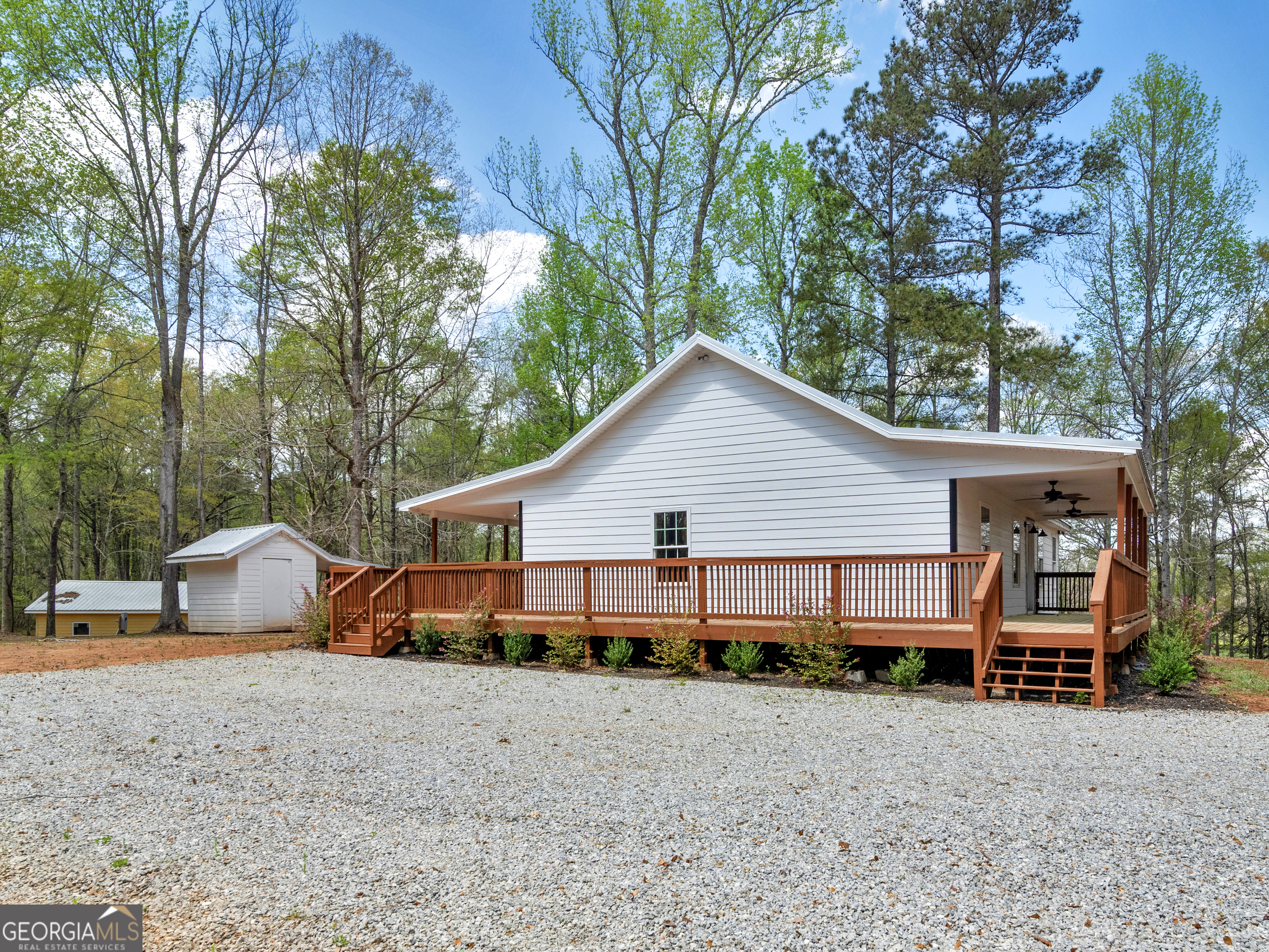 265 Steele Road Griffin, GA 30223 - Photo 52 of 64 a view of a house with large trees and large trees