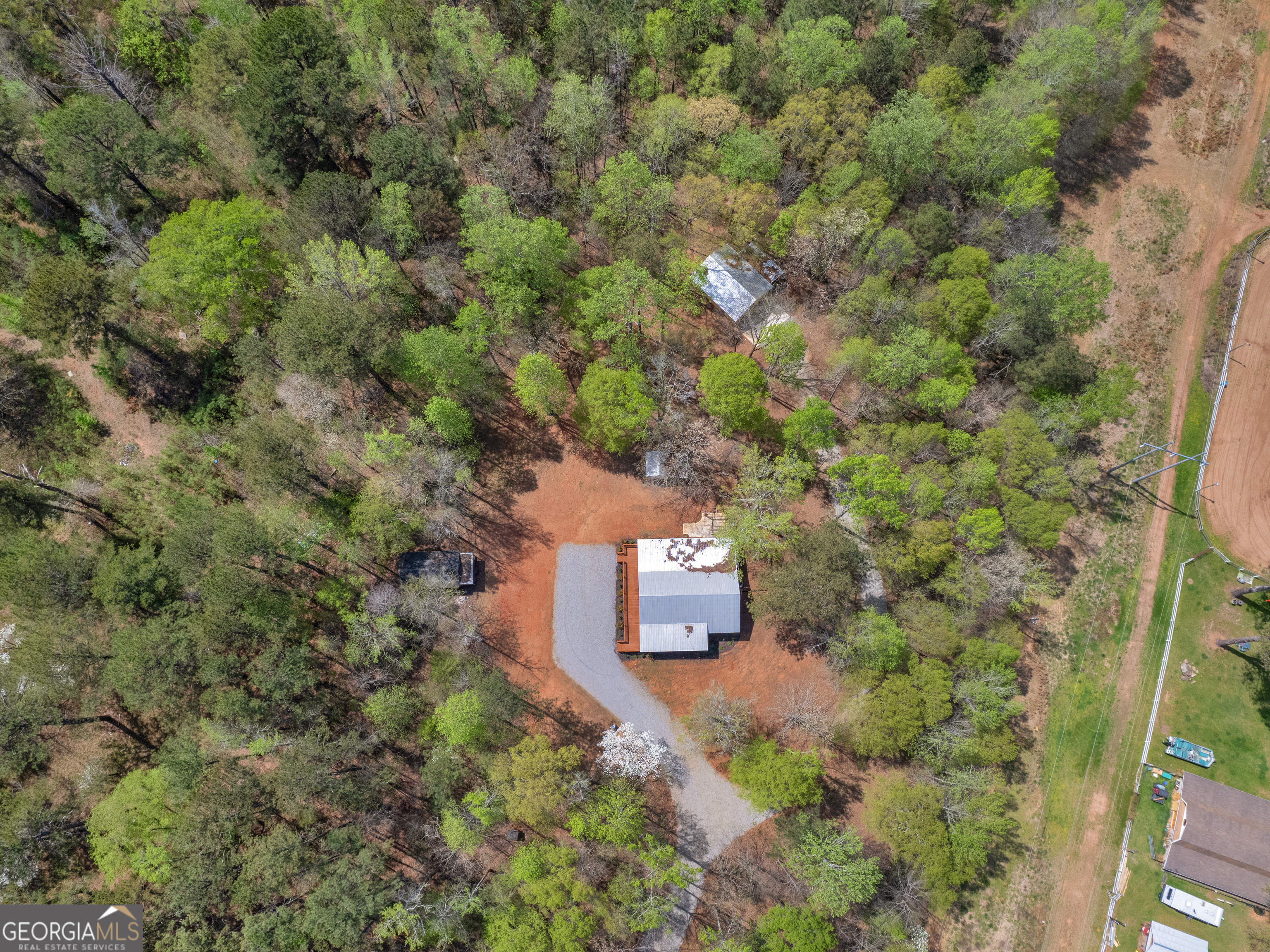 265 Steele Road Griffin, GA 30223 - Photo 57 of 64 an aerial view of a house with a yard