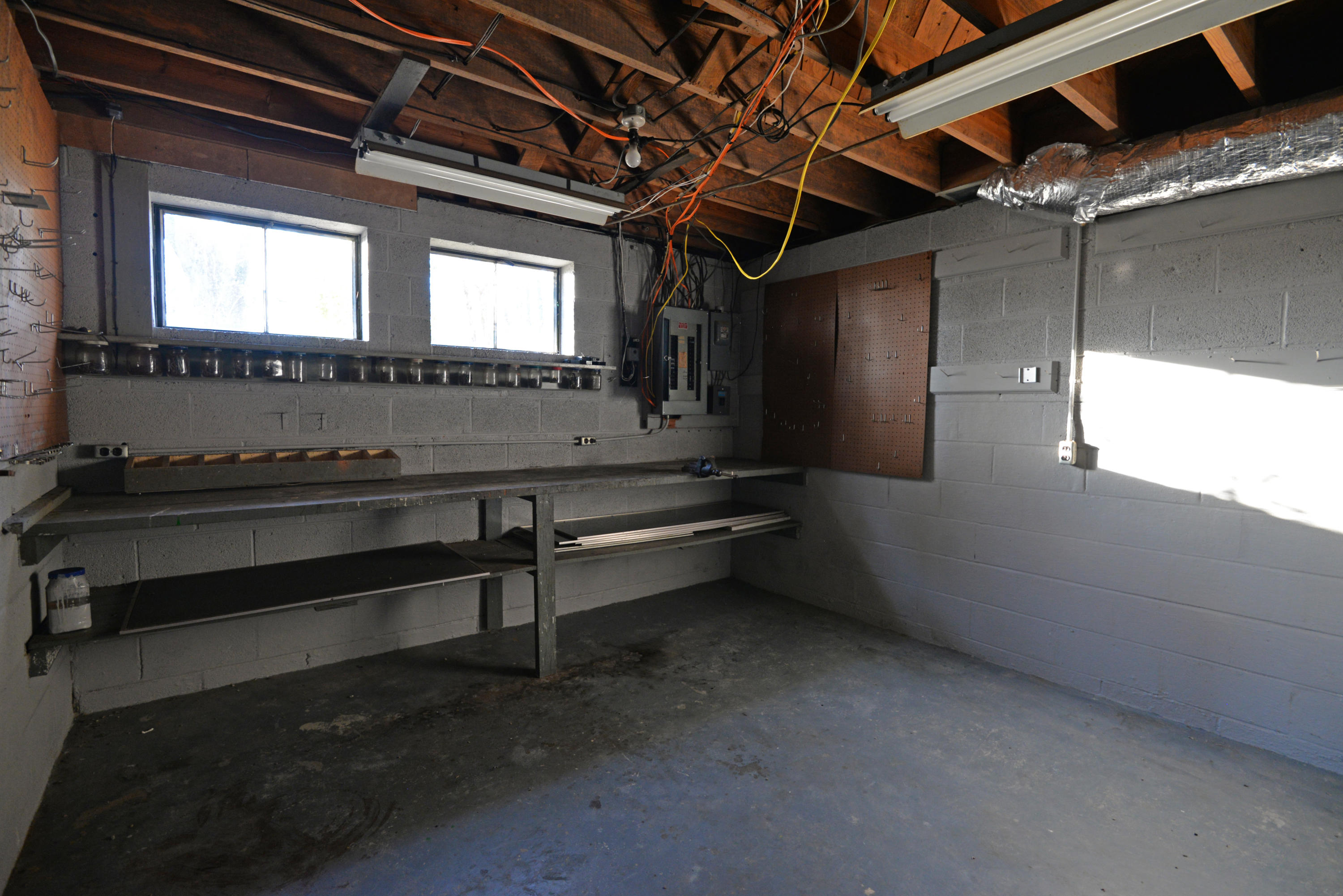104 Riverpoint Road Signal Mountain, TN 37377 - Photo 34 of 46 Basement workshop view 1