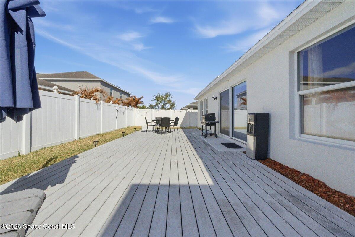 3258 Olivera Way St. Cloud, FL 34772 - Photo 7 of 30 a view of a house with wooden floor