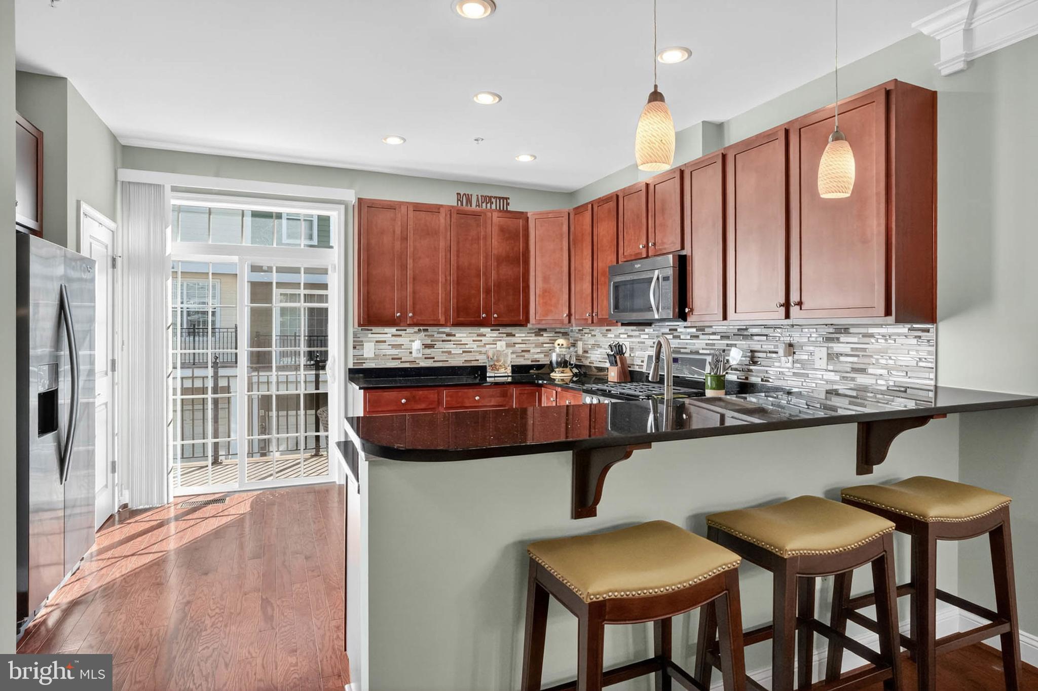 6022 Maple Hill Road Ellicott City, MD 21043 - Photo 7 of 56 High-top seating area