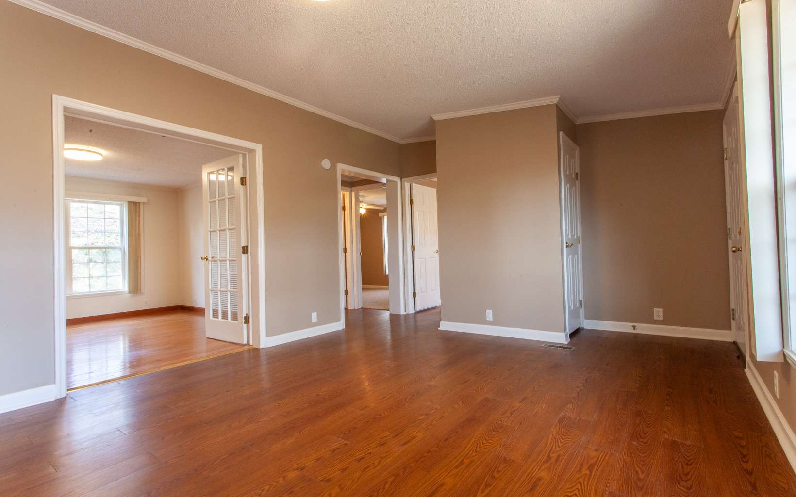 95 Misty Rdg Lane Murphy, NC 28906 - Photo 17 of 48 a view of an empty room with wooden floor and a window