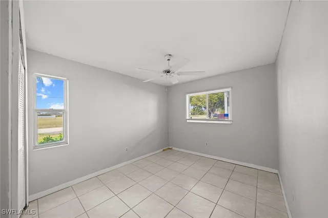 an empty room with windows