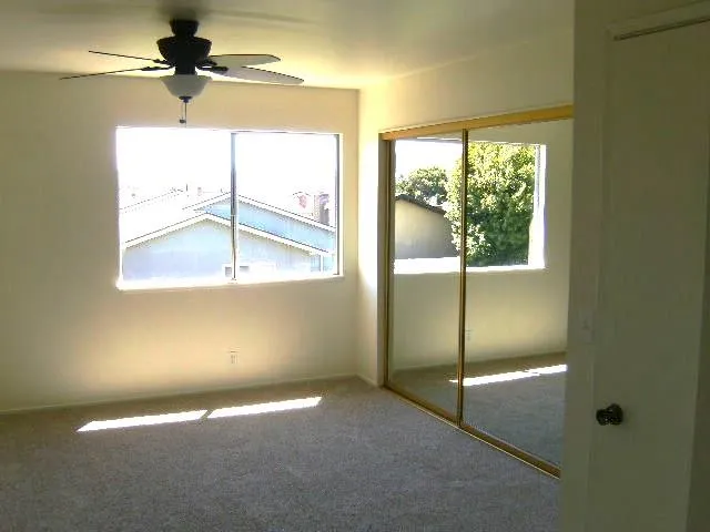 a view of an empty room with a window