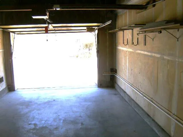 a view of a pool with a yard