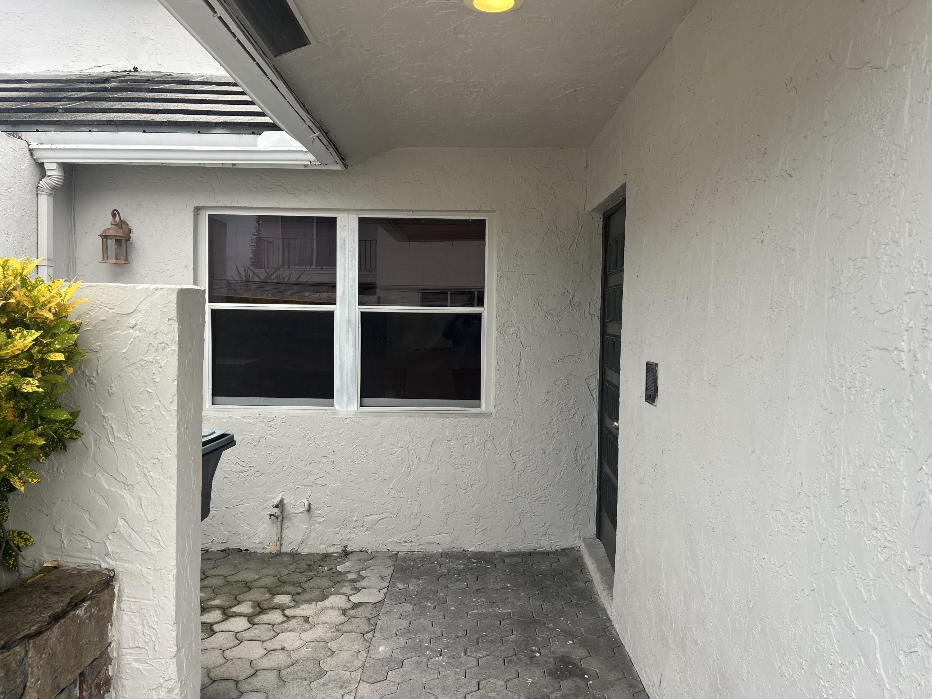 7420 Champagne Place Boca Raton, FL 33433 - Photo 2 of 32 a view of an entryway