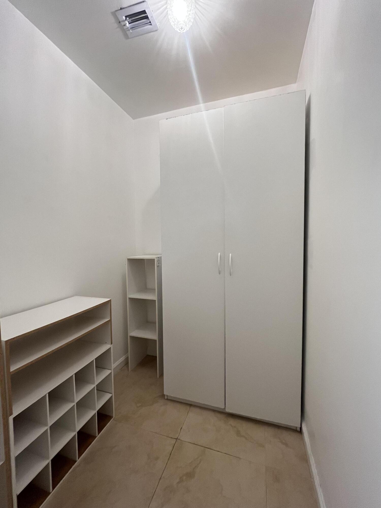 7420 Champagne Place Boca Raton, FL 33433 - Photo 23 of 32 a view of room with wooden floor and closet