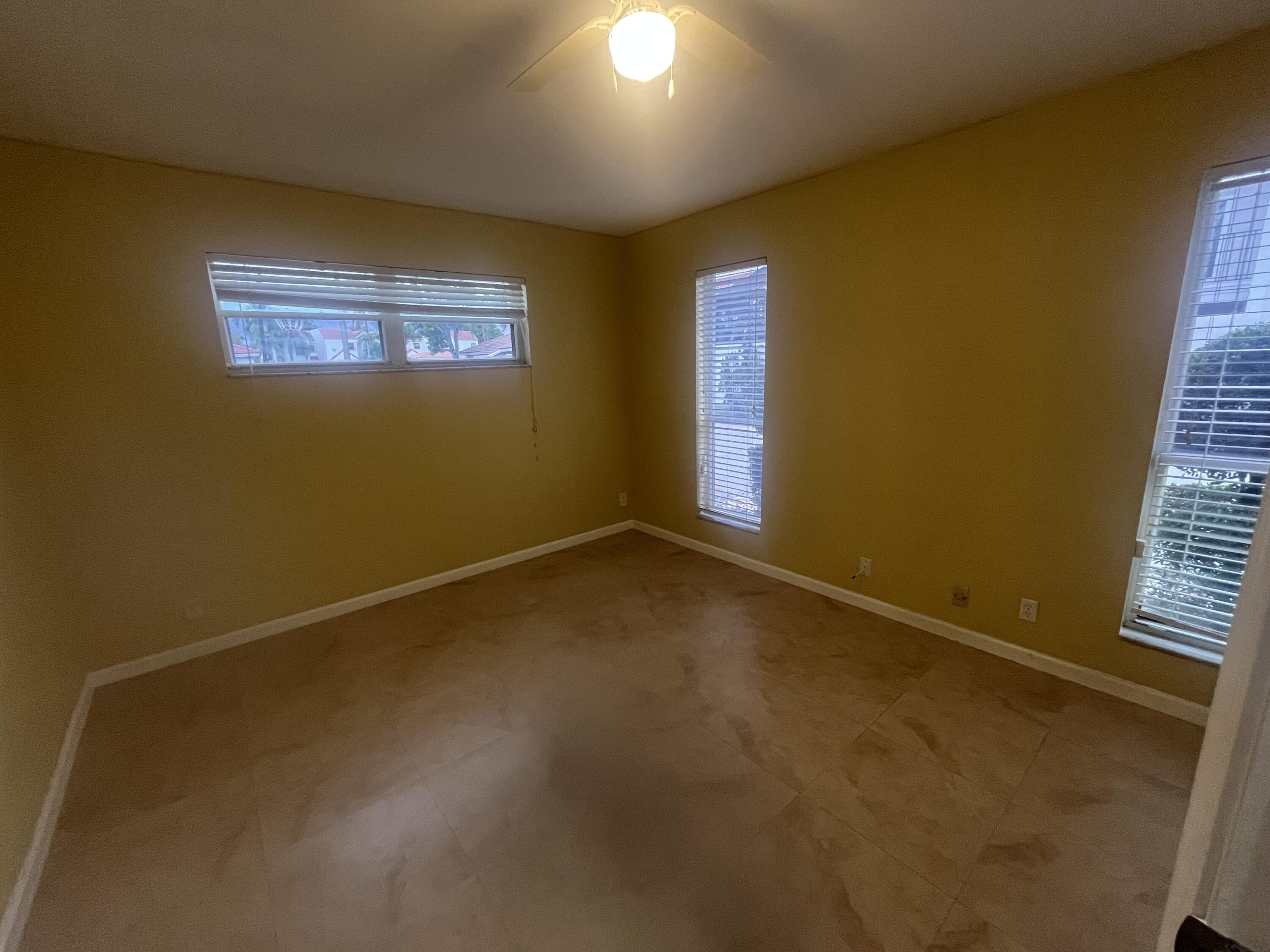 7420 Champagne Place Boca Raton, FL 33433 - Photo 31 of 32 a view of an empty room
