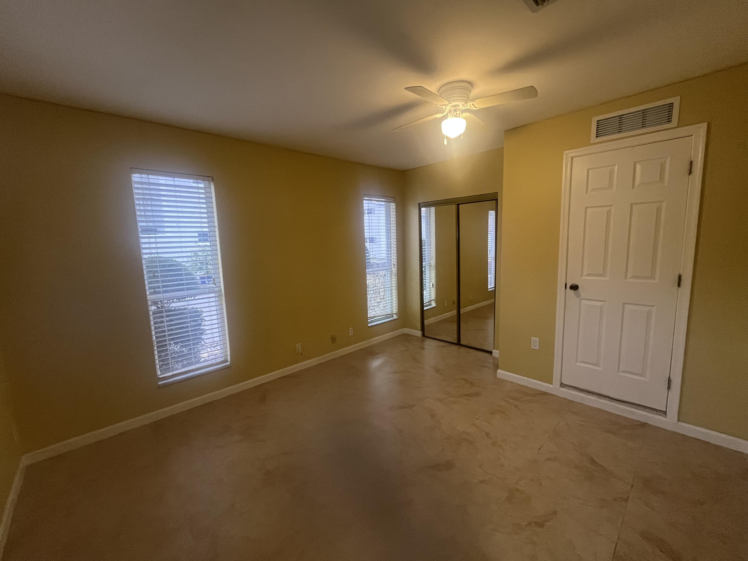 7420 Champagne Place Boca Raton, FL 33433 - Photo 32 of 32 a view of an empty room with a window