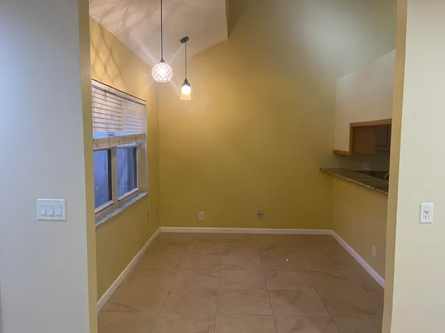 a view of hallway with washer and dryer