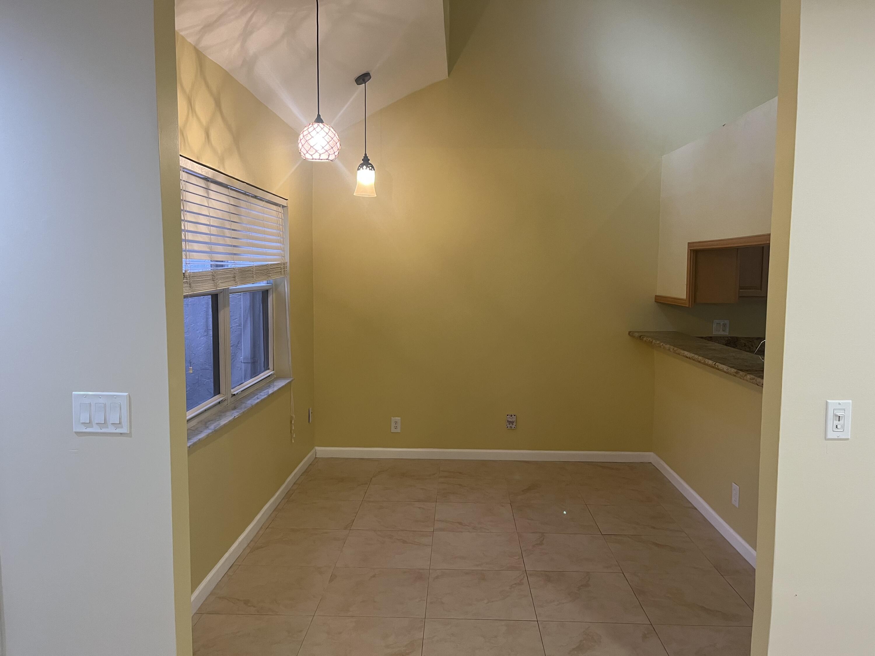 7420 Champagne Place Boca Raton, FL 33433 - Photo 8 of 32 a view of hallway with washer and dryer