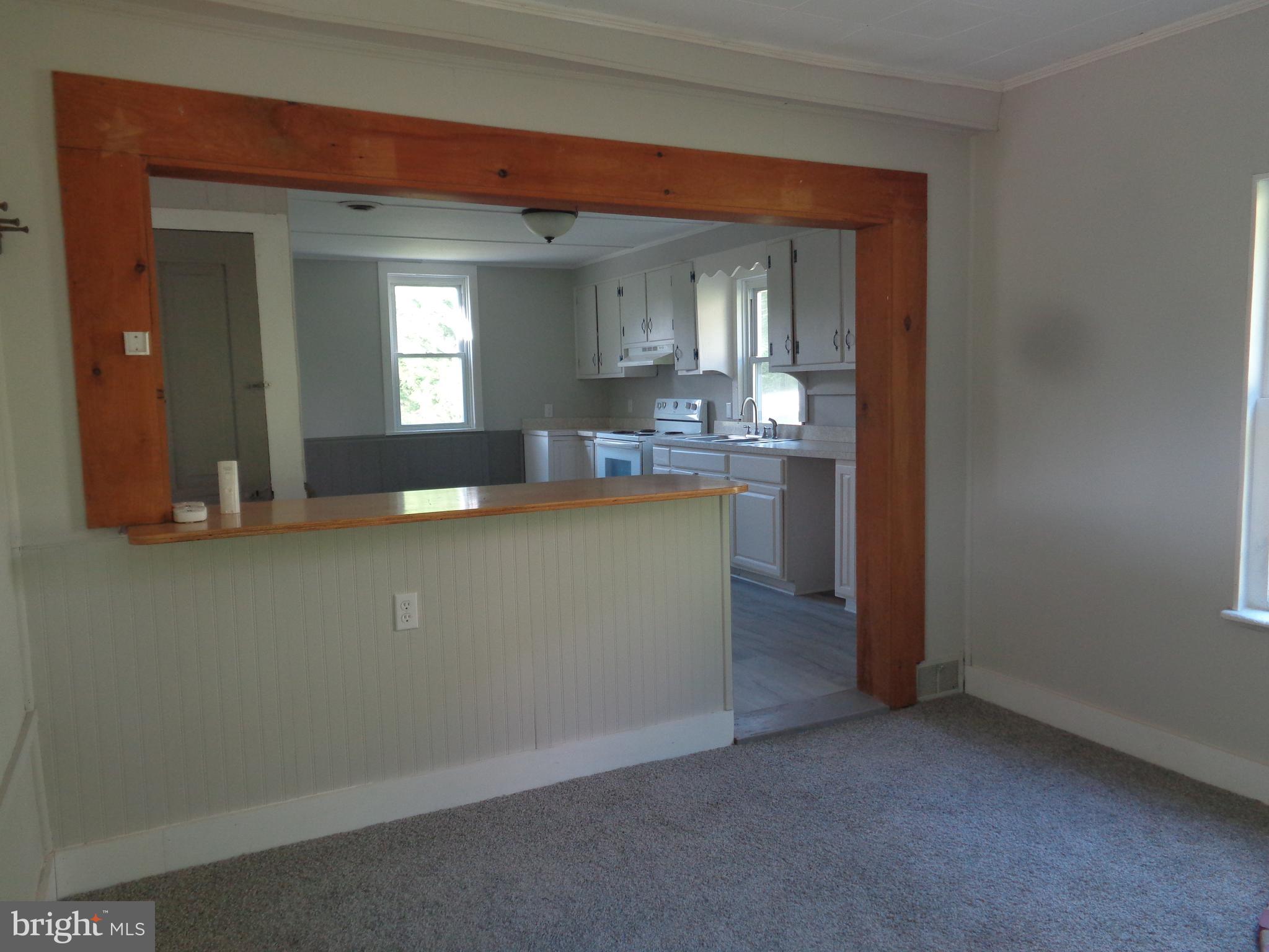 24 Fawn Road Reedsville, PA 17084 - Photo 8 of 23 DEN - LOOKING INTO KITCHEN