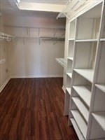 3920 Mystic Valley Parkway, Unit 115 Medford, MA 02155 - Photo 16 of 27 a view of walk in closet with empty racks