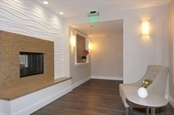 3920 Mystic Valley Parkway, Unit 115 Medford, MA 02155 - Photo 21 of 27 a workspace with furniture and wooden floor